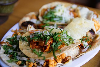 Tacos al pastor made with adobada meat